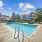 Sparkling swimming pool with lounge seating